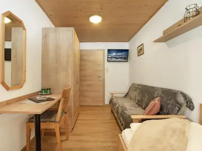 Ein Sitzbereich in der Unterkunft Haus Sonnleitn