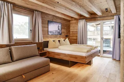 Ein Bett oder Betten in einem Zimmer der Unterkunft Chalets Schladming Ski-in Ski-out