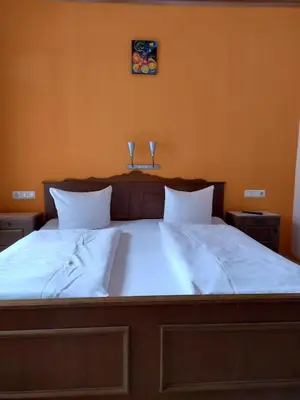 Ein Bett oder Betten in einem Zimmer der Unterkunft Gasthof zum Pfandl
