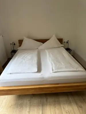 Ein Bett oder Betten in einem Zimmer der Unterkunft Gasthof zum Pfandl