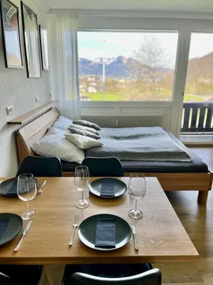 Ein Bett oder Betten in einem Zimmer der Unterkunft Wolfgangsee Seeblickplatzl 119