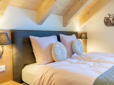 Ein Bett oder Betten in einem Zimmer der Unterkunft Ferienhaus Erna