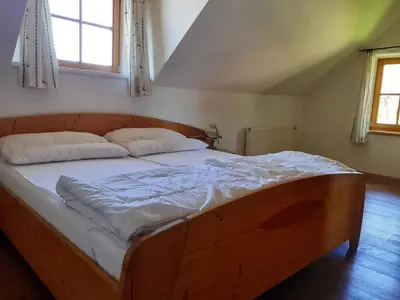 Ein Bett oder Betten in einem Zimmer der Unterkunft Lachtalhütte