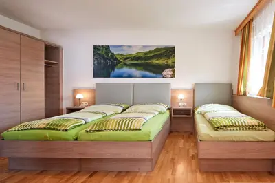 Ein Bett oder Betten in einem Zimmer der Unterkunft Bichlgut