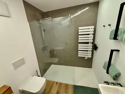 Ein Badezimmer in der Unterkunft Wolfgangsee Seeblickplatzl