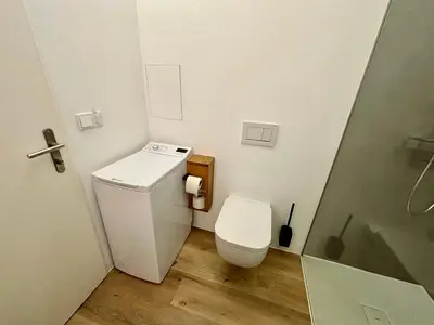 Ein Badezimmer in der Unterkunft Wolfgangsee Seeblickplatzl