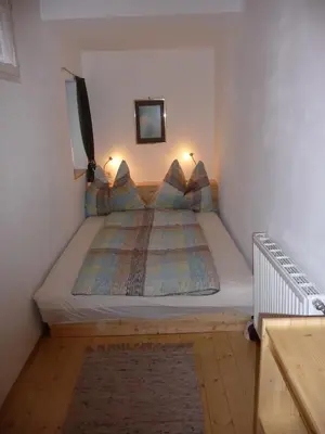 Ein Bett oder Betten in einem Zimmer der Unterkunft Haus Gradwohl