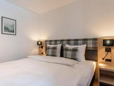 Ein Bett oder Betten in einem Zimmer der Unterkunft Chalet Pretzel
