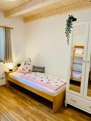 Ein Bett oder Betten in einem Zimmer der Unterkunft Bergheimat