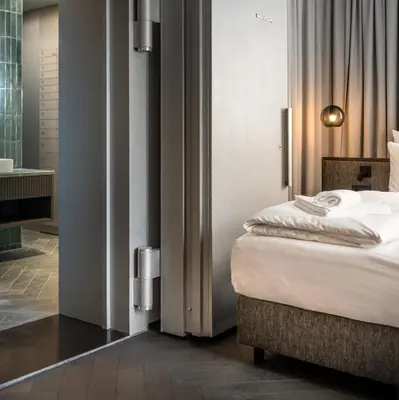 Ein Bett oder Betten in einem Zimmer der Unterkunft La Sonett