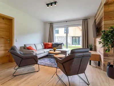 Ein Sitzbereich in der Unterkunft Mountain Chalet Bergfreund