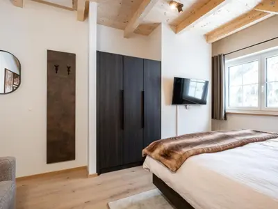 Ein Bett oder Betten in einem Zimmer der Unterkunft Edelweiss Lodge