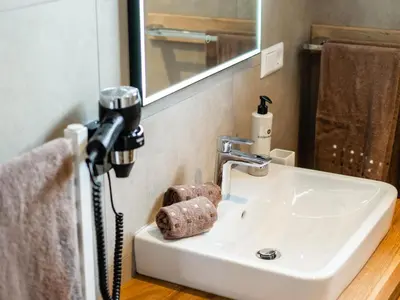Ein Badezimmer in der Unterkunft Edelweiss Lodge