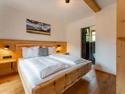 Ein Bett oder Betten in einem Zimmer der Unterkunft AlmApARTment Mauterndorf Pichl 8-1