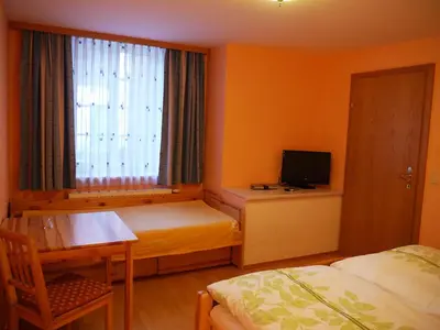 Ein Bett oder Betten in einem Zimmer der Unterkunft Schusterhäusl