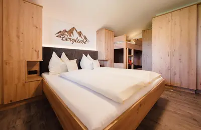 Ein Bett oder Betten in einem Zimmer der Unterkunft Familienbauernhof Samerhof