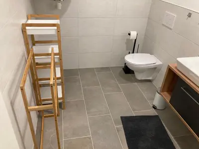 Ein Badezimmer in der Unterkunft Neue Wohnung 