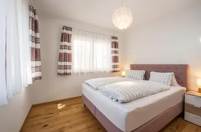 Ein Bett oder Betten in einem Zimmer der Unterkunft Appartement Alpengefühl am Dachstein