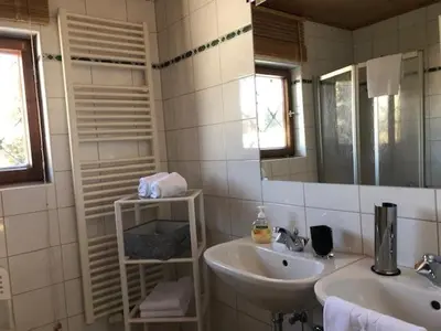Ein Badezimmer in der Unterkunft CHALET MARESI