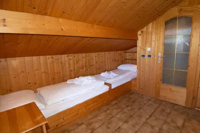 Ein Bett oder Betten in einem Zimmer der Unterkunft CHALET MARESI