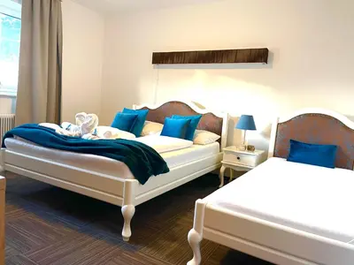 Ein Bett oder Betten in einem Zimmer der Unterkunft Appartements-Dalila