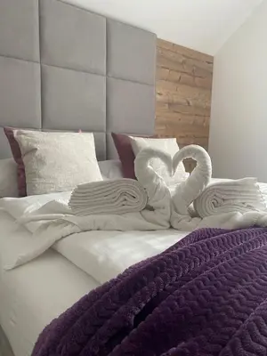 Ein Bett oder Betten in einem Zimmer der Unterkunft Appartements-Dalila