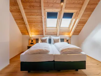 Ein Bett oder Betten in einem Zimmer der Unterkunft Mountain Chalet Alpinchique