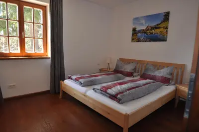 Ein Bett oder Betten in einem Zimmer der Unterkunft Apartments-Weberlandl