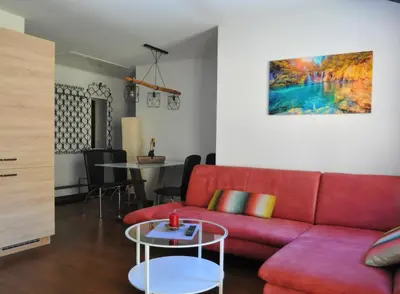 Ein Sitzbereich in der Unterkunft Apartments-Weberlandl