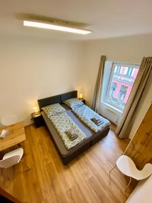 Ein Bett oder Betten in einem Zimmer der Unterkunft Apartment Loser im Zentrum
