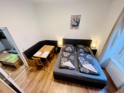 Ein Bett oder Betten in einem Zimmer der Unterkunft Apartment Loser im Zentrum