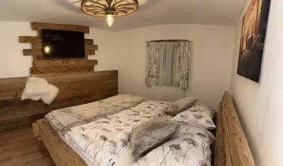 Ein Bett oder Betten in einem Zimmer der Unterkunft Gaisbergblick