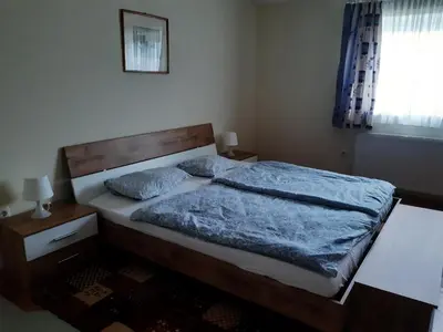 Ein Bett oder Betten in einem Zimmer der Unterkunft Ferienwohnung Haus Graf