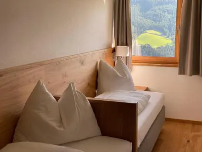 Ein Bett oder Betten in einem Zimmer der Unterkunft Appartement Josef am Untersüßgut