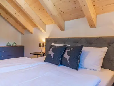 Ein Bett oder Betten in einem Zimmer der Unterkunft Apart Heidi