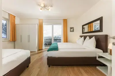 Ein Bett oder Betten in einem Zimmer der Unterkunft Bella Vista Appartements by Schladming-Appartements
