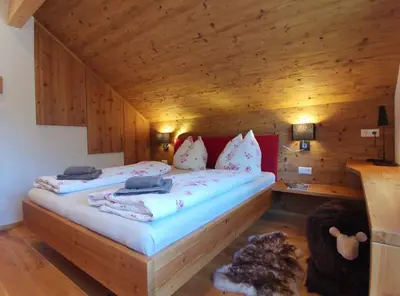 Ein Bett oder Betten in einem Zimmer der Unterkunft Chalet Tauplitz