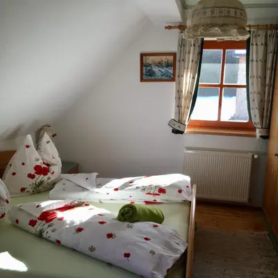 Ein Bett oder Betten in einem Zimmer der Unterkunft Bio-Bauernhof Anawander