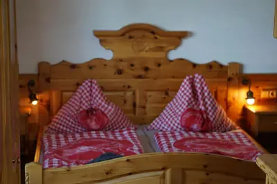 Ein Bett oder Betten in einem Zimmer der Unterkunft Hainererhof