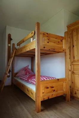 Ein Bett oder Betten in einem Zimmer der Unterkunft Hainererhof