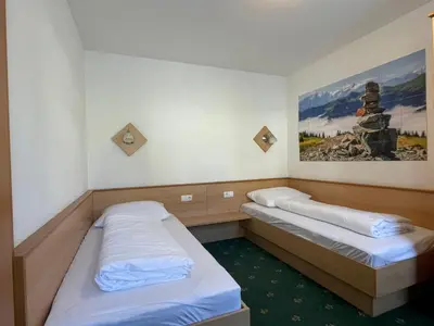 Ein Bett oder Betten in einem Zimmer der Unterkunft Apartment Heijerhof - Top 4