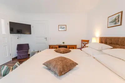 Ein Bett oder Betten in einem Zimmer der Unterkunft Villa Eisl-Raudaschl