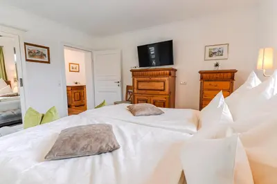 Ein Bett oder Betten in einem Zimmer der Unterkunft Villa Eisl-Raudaschl