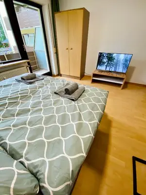 Ein Bett oder Betten in einem Zimmer der Unterkunft Apartment Dachstein nahe Zentrum