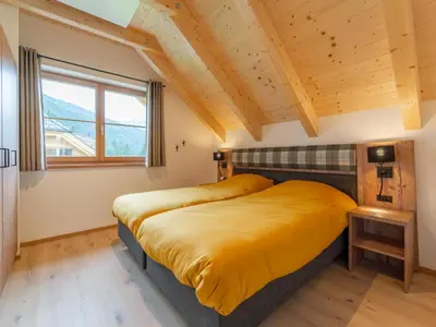 Ein Bett oder Betten in einem Zimmer der Unterkunft Haus Rapunzel