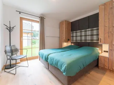 Ein Bett oder Betten in einem Zimmer der Unterkunft Haus Rapunzel