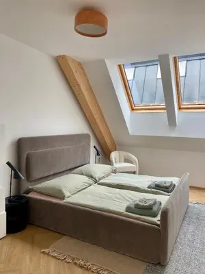 Ein Bett oder Betten in einem Zimmer der Unterkunft Marktplatz-Residenz - 110 m vom Traunsee
