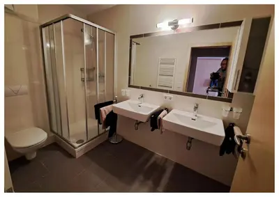 Ein Badezimmer in der Unterkunft Laerchenlodge