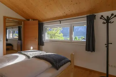 Ein Bett oder Betten in einem Zimmer der Unterkunft Ferienlodge MaResi
