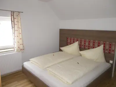 Ein Bett oder Betten in einem Zimmer der Unterkunft Appartement Großwallner